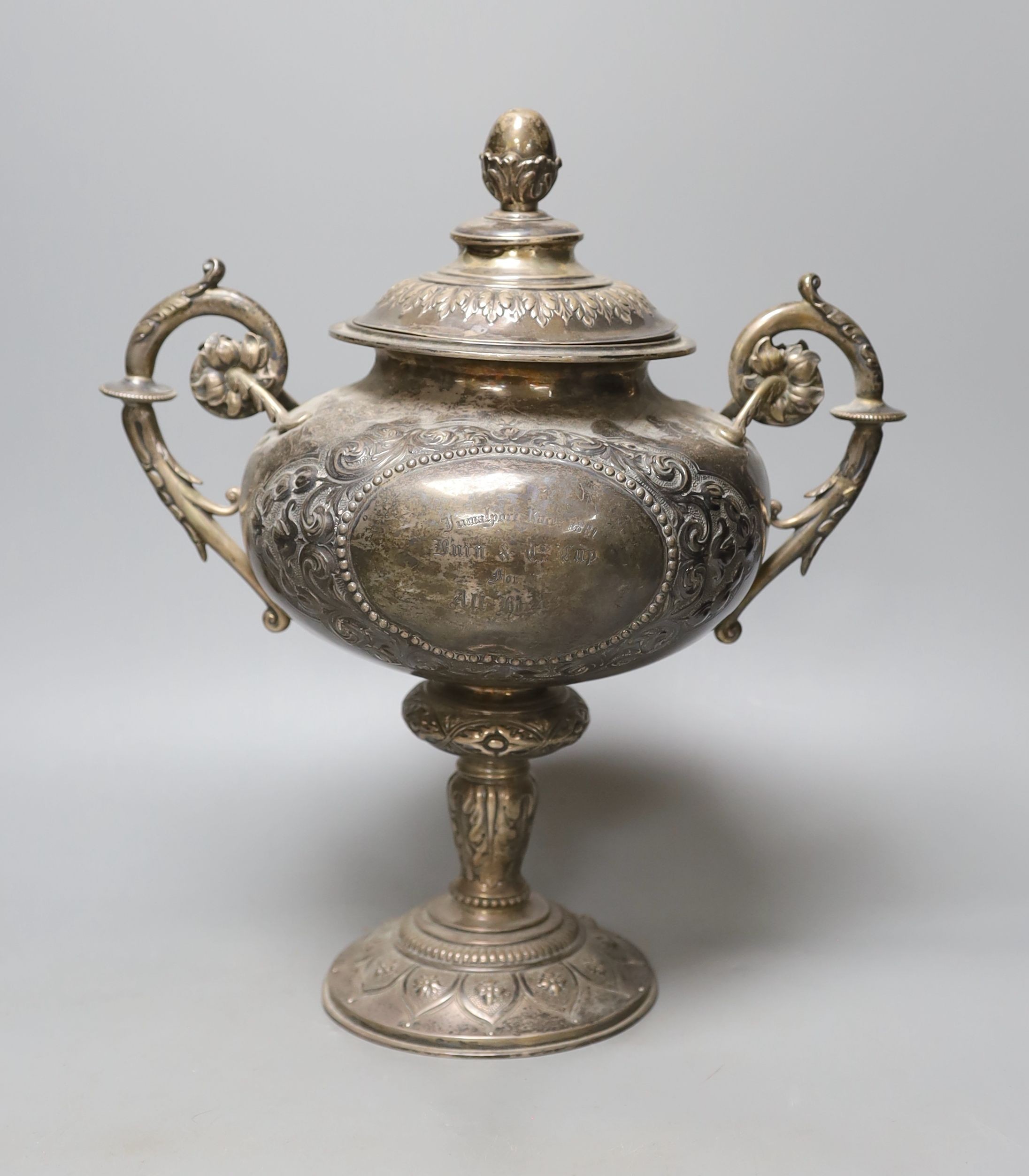 A Victorian silver presentation two handled trophy cup and cover, by Henry Holland